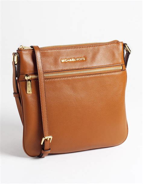 michael kors crossbody plain brown|Michael Kors brown leather handbag.